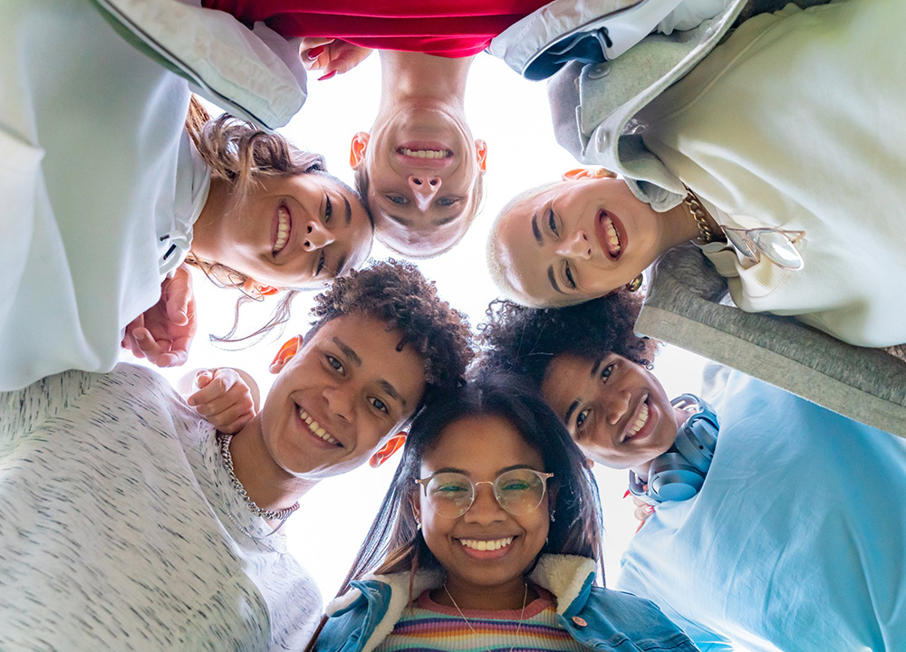 A group of children smiling.