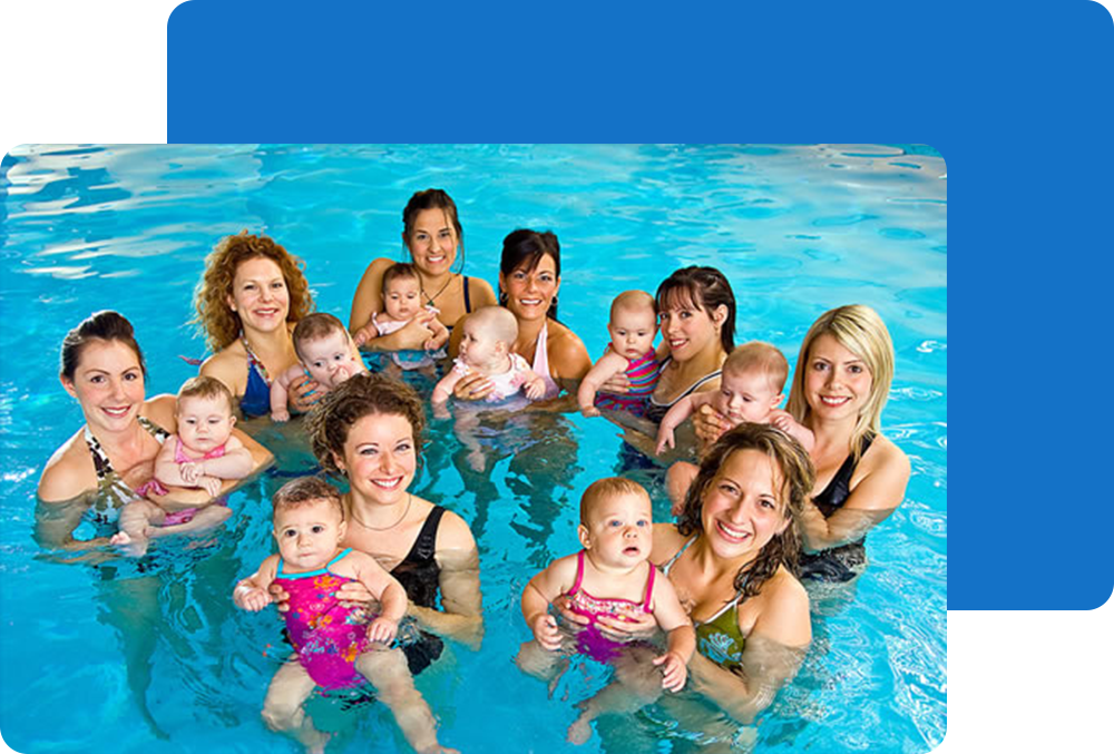 Women holding their babies in a swimming pool. Around 2004.