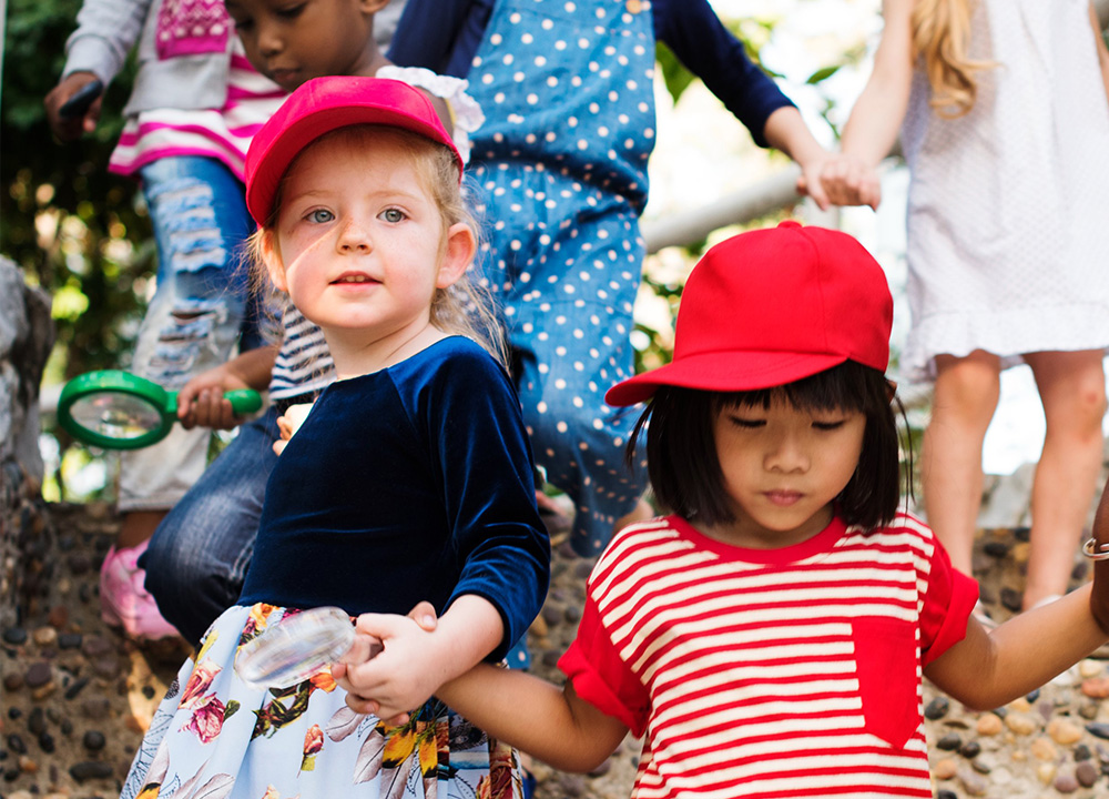 A group of kindergarteners exploring.