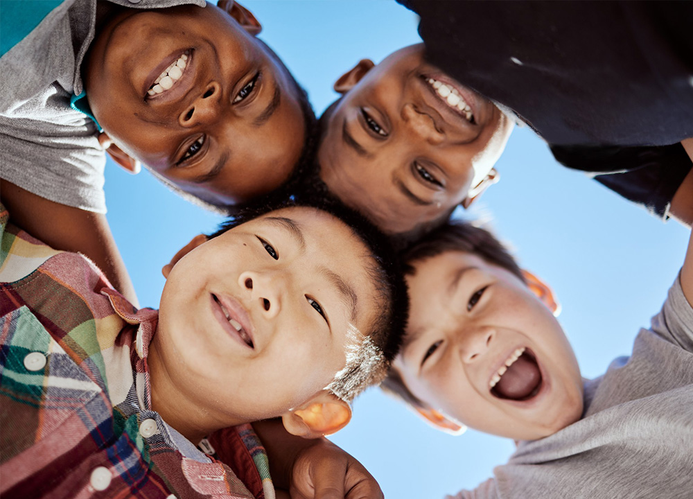 A group of boys smiling.