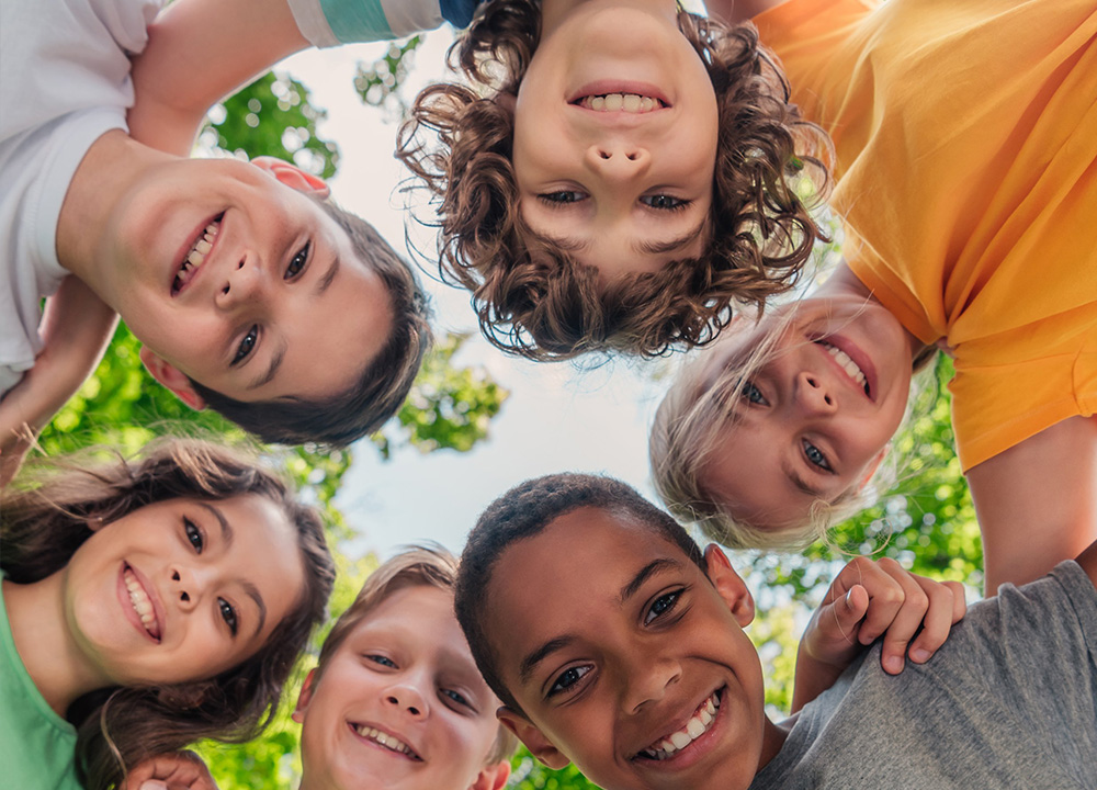 A group of children smiling
