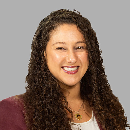 headshot of Joanna Caceres-Aponte