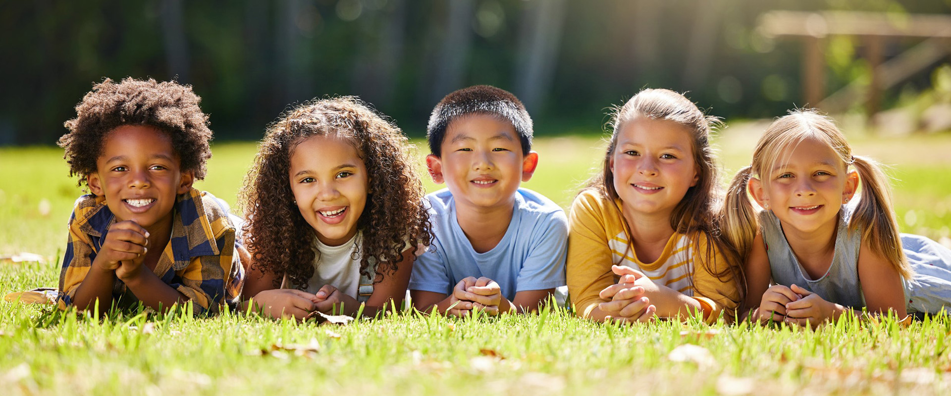 A group of children smiling.