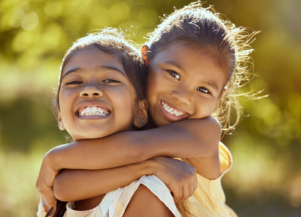 Two smiling little girls.